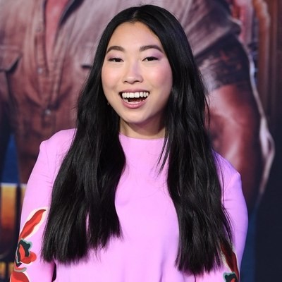 Awkwafina with long hair and blunt ends